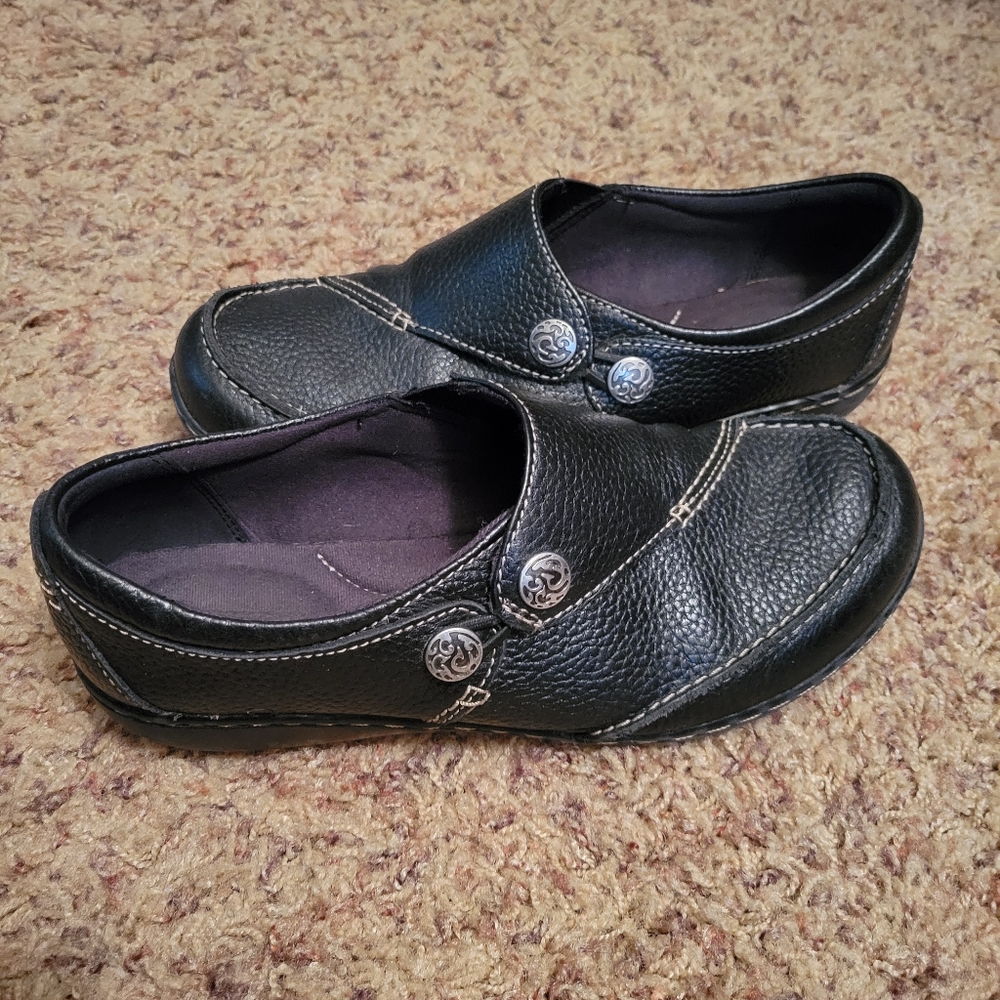 Black slip on Clarks shoes, size 7.5
